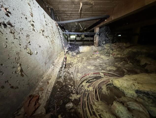 Torn Vapor Barrier