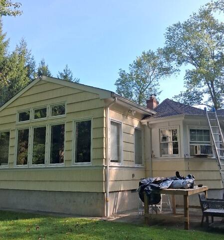 Tidying the site and masking off the patio area while preparing the sunroom addition for primer.