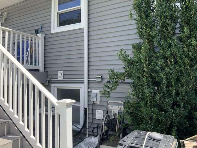 Front/exterior view of the home before the radon mitigation system installation.