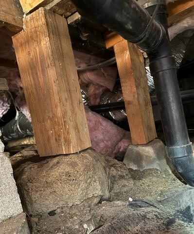 Subfloor Posts Lifted Off of Footings