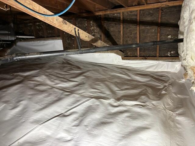 Crawl Space Vapor Barrier Installed Along Perimeter