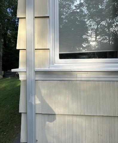 Fully restored, sealed, and freshly painted window sill with complete weatherproofing protection