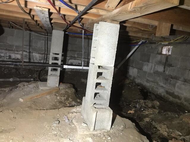 Unprotected Crawl Space Before Repairs