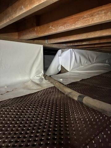 Crawl Space Drainage and Moisture Control System