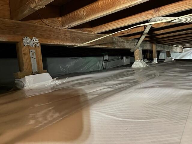Completed Crawl Space Moisture Barrier Installation