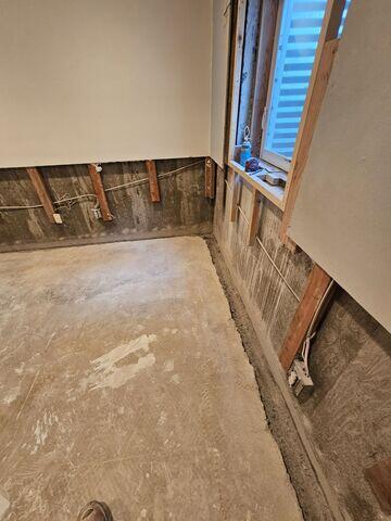 Basement with signs of water damage