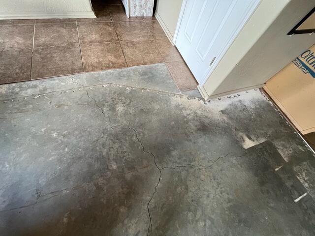 Cracked Concrete Floor Before Repair in Flagstaff, AZ