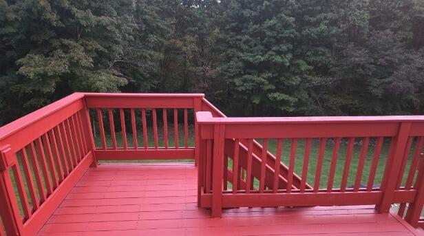 Clean, uniform stain application across deck boards and railings for a flawless, vibrant finish