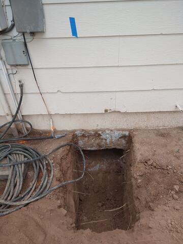 Foundation Excavation for Helical Pier Installation