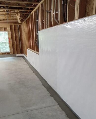 Vapor Barrier & Perimeter Drainage System Installed