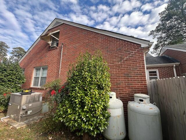 Stair-Step Cracks Along Exterior Brick Wall