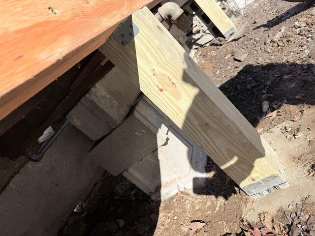 Support Posts Secured to Porch