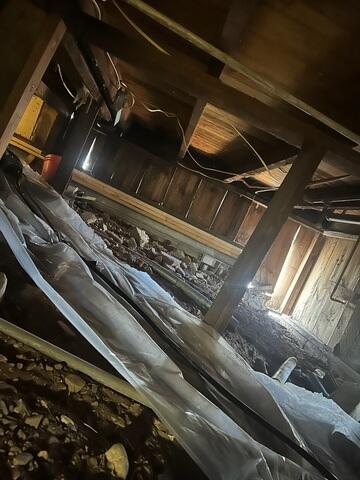 Underfloor Framing and Existing Wooden Support Posts
