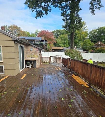 Targeted board replacement and wood repair to prep large residential decks for long-lasting protection.