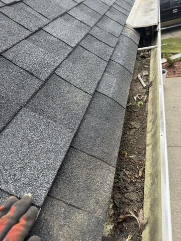 Removal of the top section of metal gutter