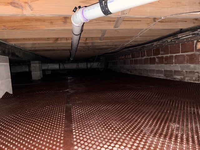 Drainage Matting Installed Across Crawl Space Floor