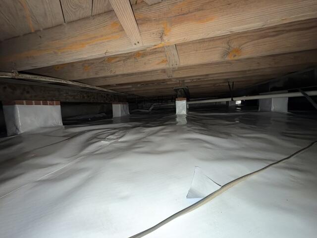 Vapor Barrier Seals the Crawl Space Floor