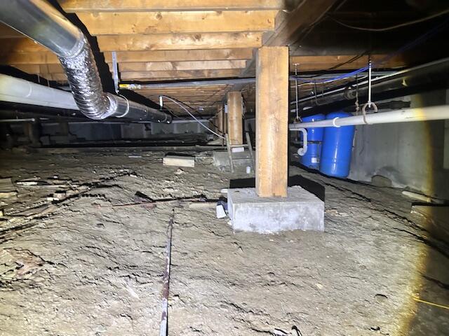 Damp, Musty Crawl Space