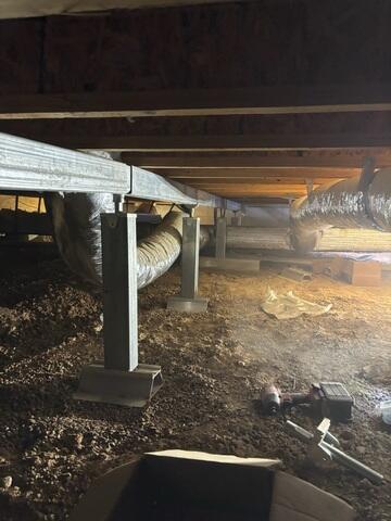 SmartJack Supports and Steel Beam Installed Beneath the Floor