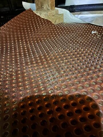 Drainage Matting Beneath the Crawl Space Vapor Barrier