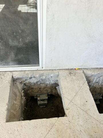 Push Pier Installation Near a Sliding Door in Santa Ana