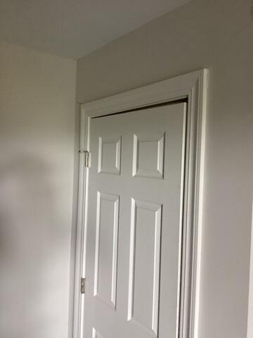 Wall Crack Near an Interior Doorway Before Repair