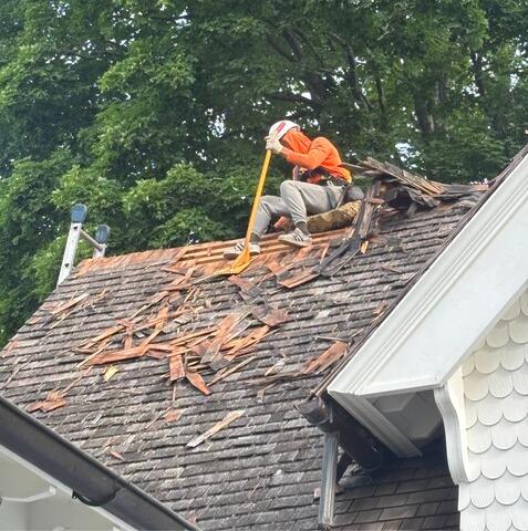 Removing Cedar Shakes and Exposing Skip Sheathing
