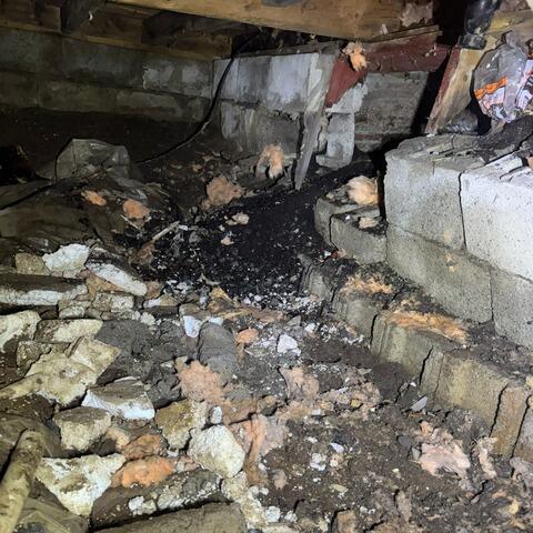 Before the work began: a crawl space in need of renovation