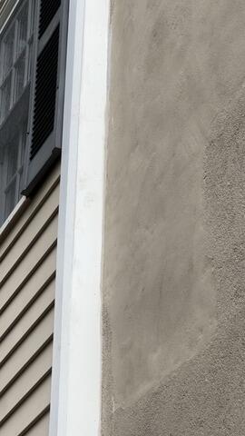 After restoration: Fully sealed, recaulked, and painted trim joints providing total moisture protection.