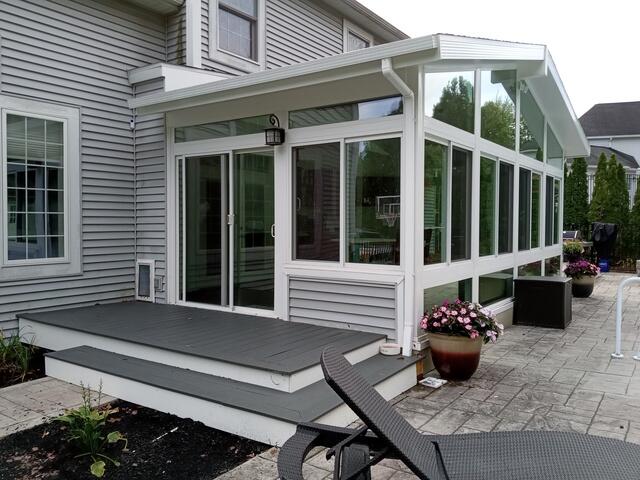Todd and Orianna's sunroom by the pool in Mechanicville