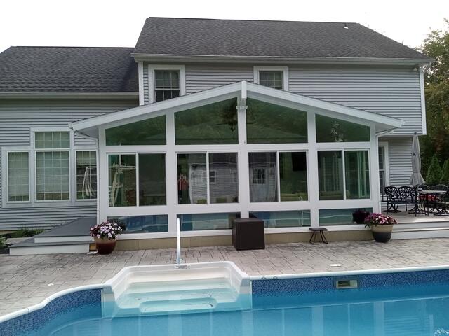 Todd and Orianna's sunroom by the pool in Mechanicville