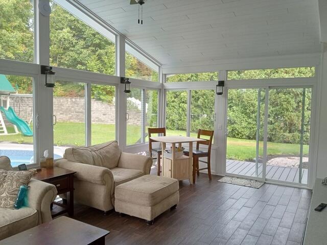 Todd and Orianna's sunroom by the pool in Mechanicville