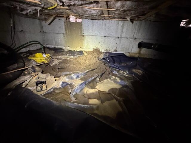 Water Stain on Foundation Wall Beneath Vent