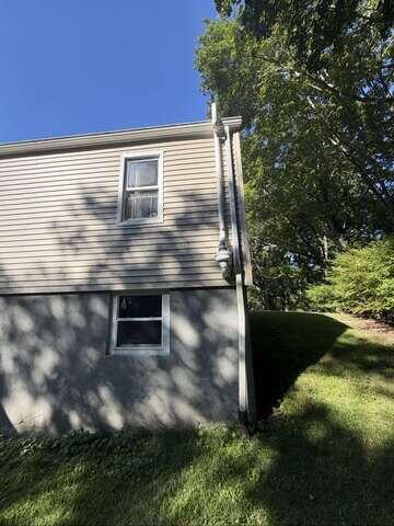Exterior Radon Fan and Vibration Connections