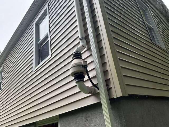 Exterior Radon Fan and Vibration Connections