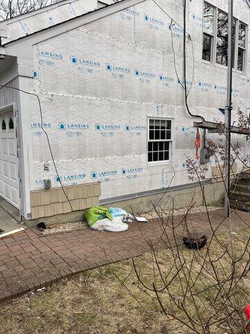A close up of the layers of siding protection