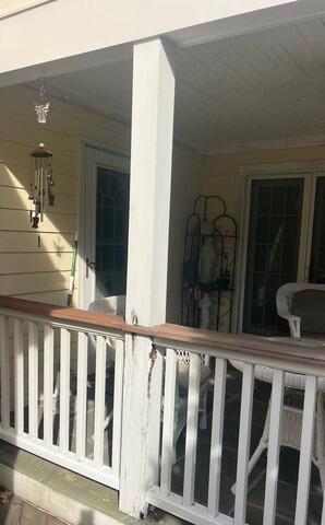 Damaged post and railing