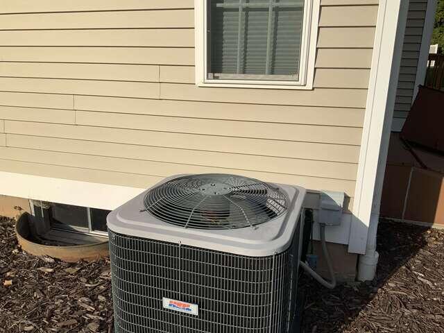 Exterior Air Conditioning Unit and Foundation