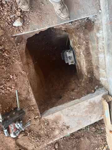 Helical Pier Bracket at the Foundation