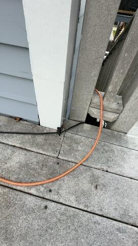Detailed inspection of composite decking clearance and vertical support trim posts