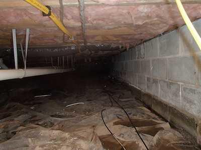 Bare walls and fiberglass insulation