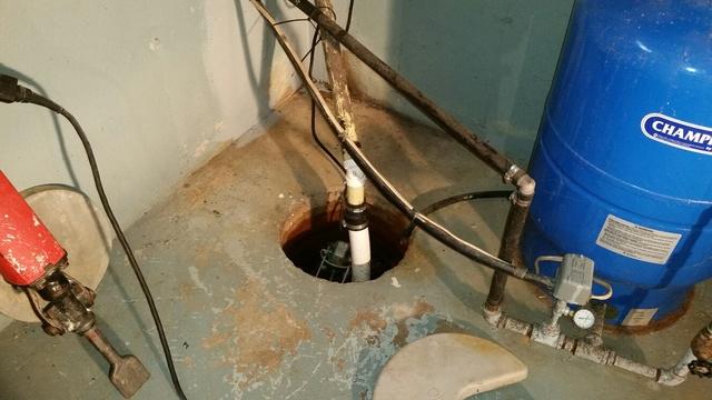 Open, Inefficient Sump Pump 