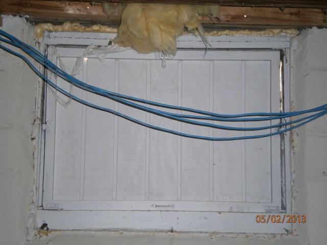 Leaky Access Panel in Duluth, MN Office Basement