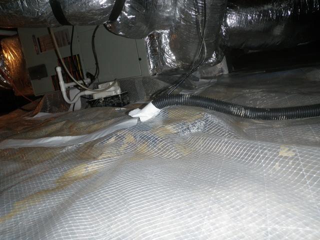 Sometimes sump pumps are improperly installed. The flexible sump pump hose in this picture from a Delmar, DE home is bent in more than one place, causing flow restriction that could back up into the pump and its well. When you have one of Dr. Energy Saver's Smart Sump's installed, we use hard PVC pipes allowing for a consistent pump. This means you are less likely to have restricted flow and damage. Contact Dr. Energy Saver today to schedule your free sump pump checkup with one of our certified inspectors!