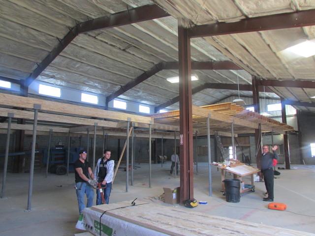 Owner Tom Roman Overlooking Construction