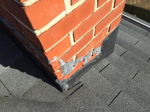 This chimney had been previously improperly flashed, and was causing a leak to occur in the home.