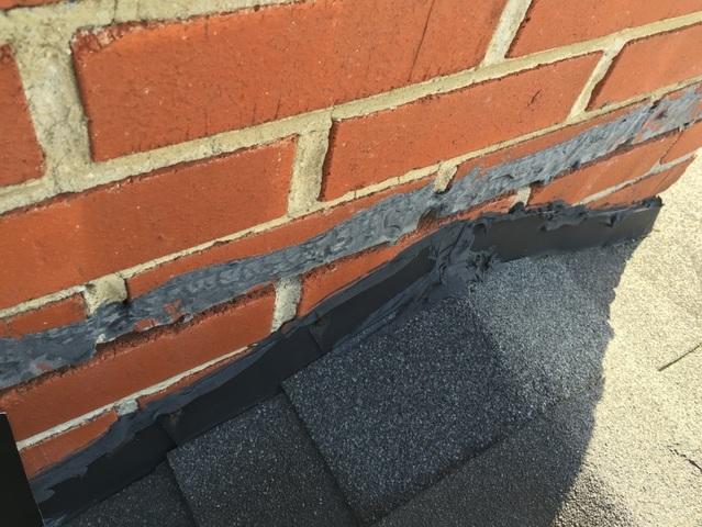 This chimney had been previously improperly flashed, and was causing a leak to occur in the home.