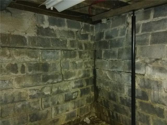 <p>Horizontal and vertical cracks ran across the Wrightstown, NJ basement. This foundation needed to reinforced!</p>