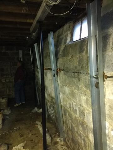 <p>The homeowner was alarmed by how much his foundation wall was bowing. With the support system installation, this bowing wall will be safely straightened.</p>