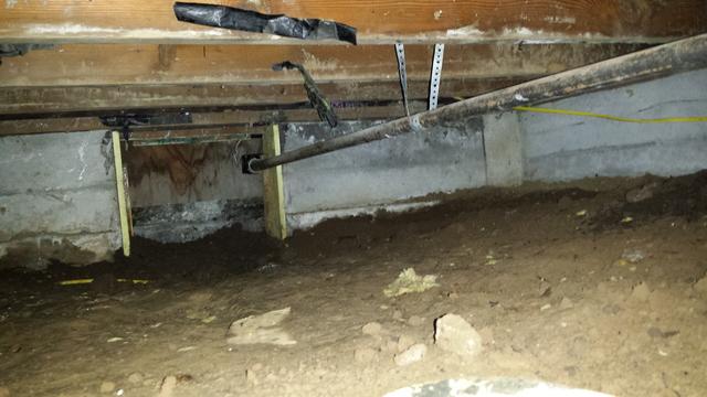 Dirty open crawlspace 